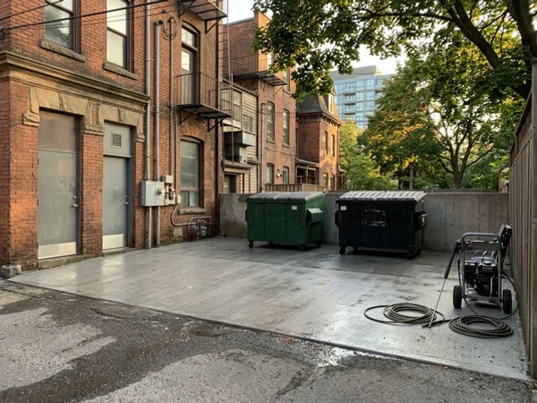 Dumpster pad cleaning Toronto degreasing in Trinity Bellwoods (after)