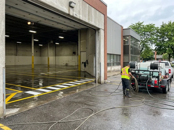 Mississauga warehouse floor with bright safety lines after washout